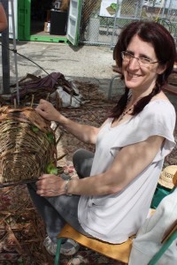 EartHand Gleaners - woman making basket